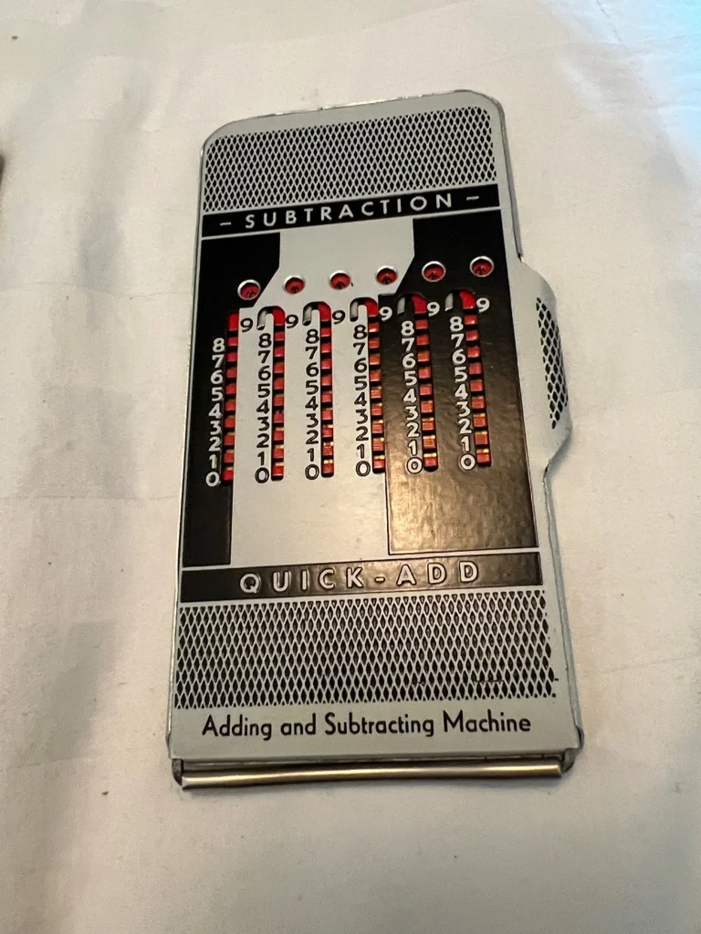1950’s - 1960’s vintage Quick-Add Handheld Adding/Subtracting Machine - Silver